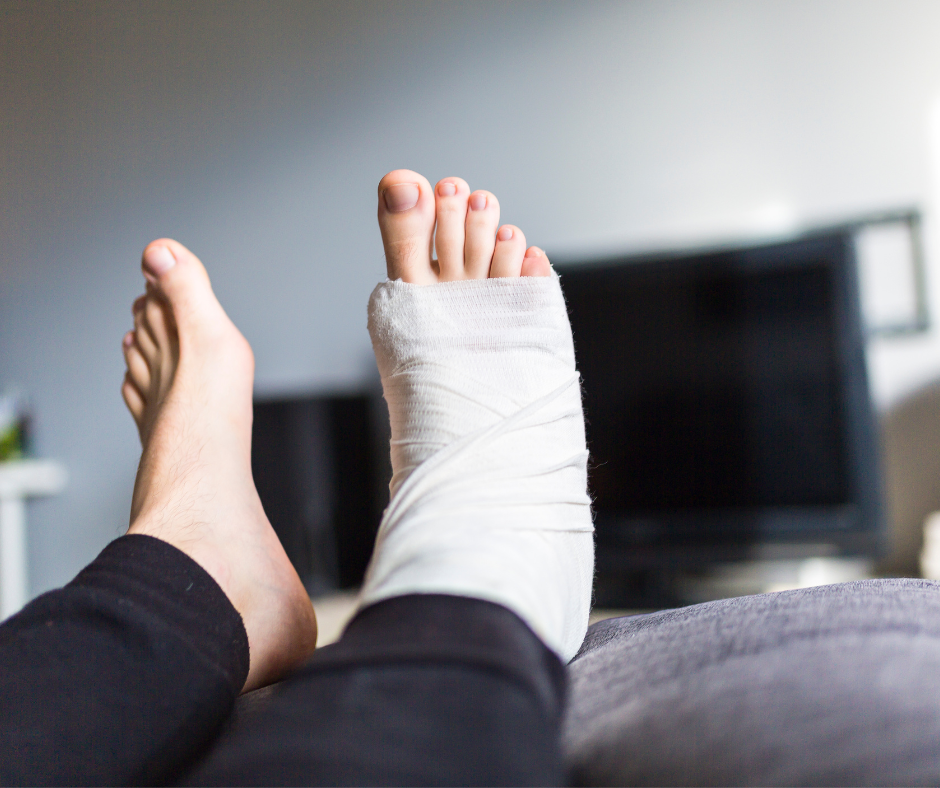 foot with a bandage that is sprained or fractured